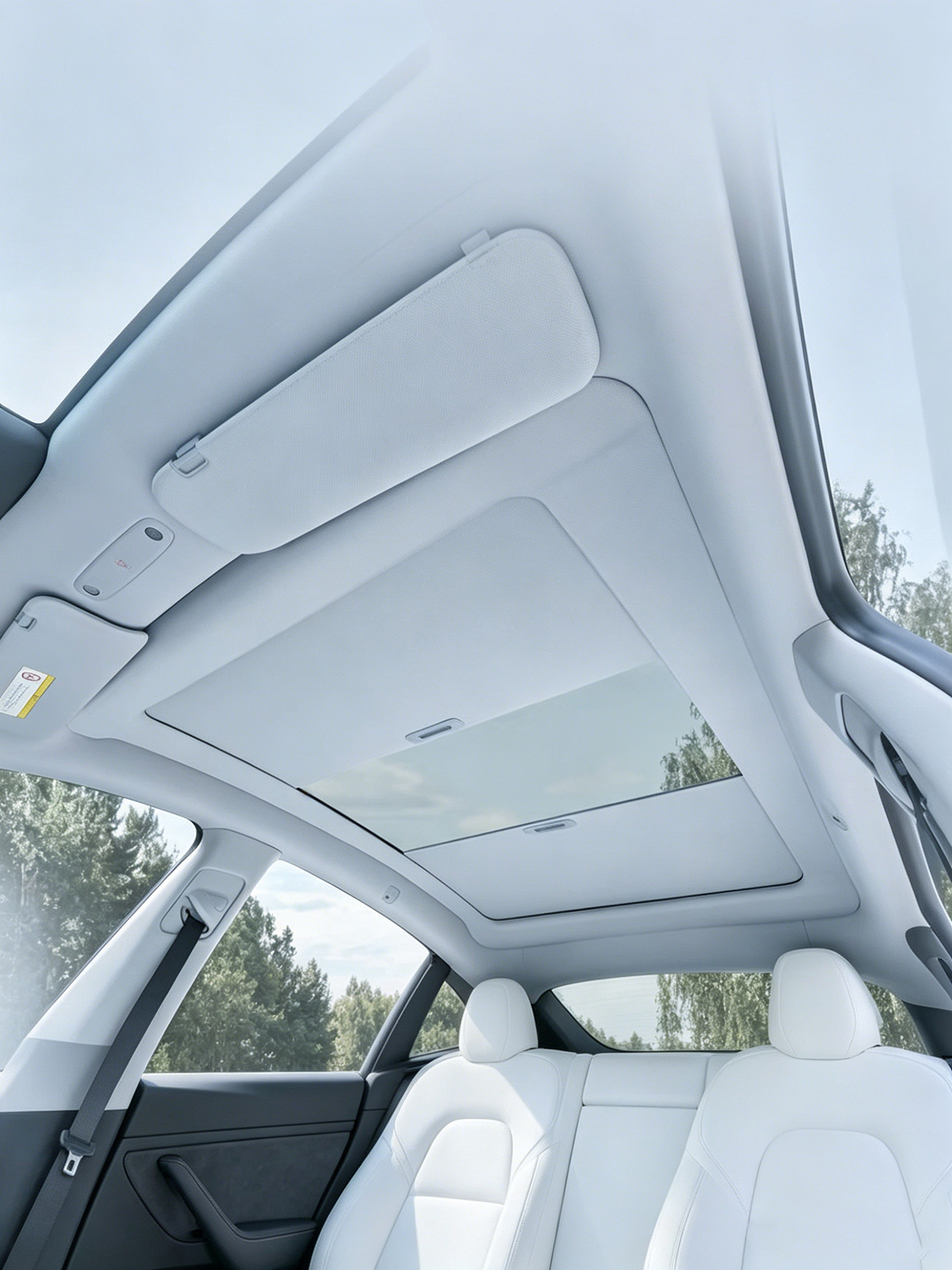 Interior overhead view of Aegiswarn AW-MS2-TMY manual roof sunshade for Tesla Model Y