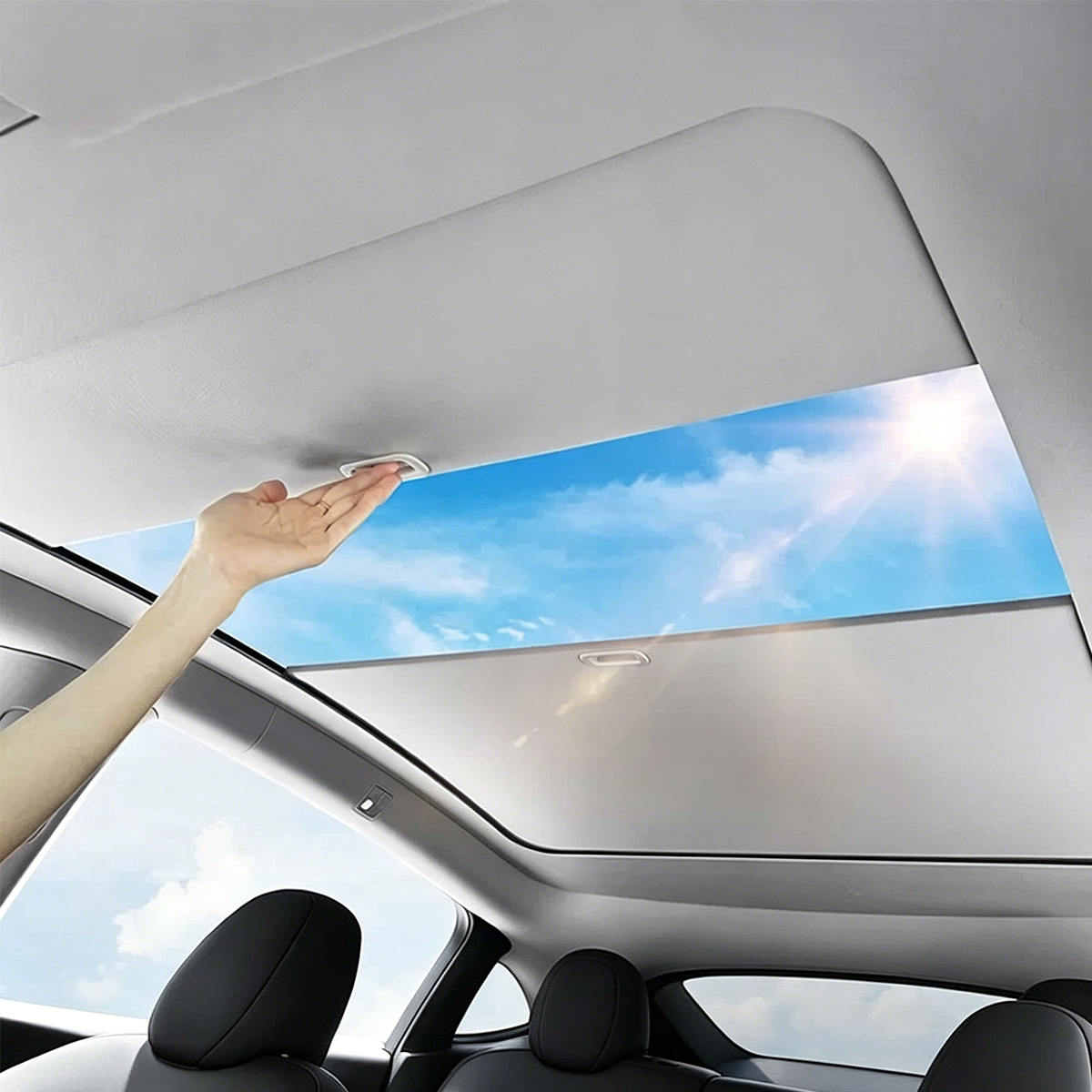 Hand opening the Aegiswarn AW-MS2-TMY manual retractable roof sunshade in Tesla Model Y