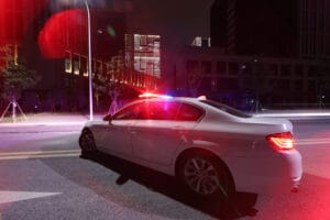 Red Blue LED Emergency Warning Lightbar, Night scene real shot with AW-815L Aegiswarn lightbar fitted on police sedan